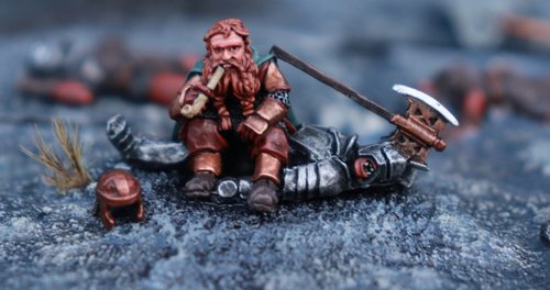 Gimli on dead Uruk-Hai