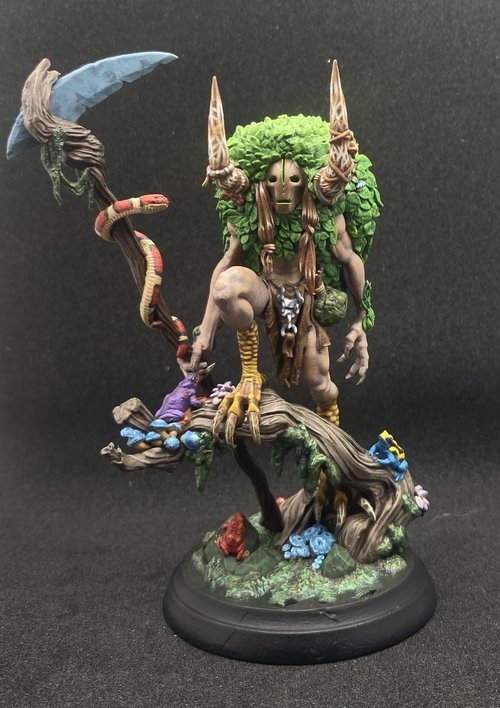 Faceless Guardian of the Wild Grove and his snake,