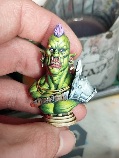 Orc standing next to campfire